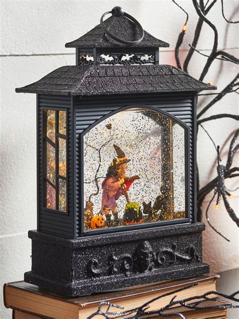 Witch with an illuminated lantern